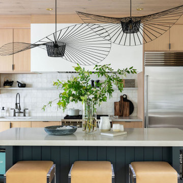 Natural Rift-Cut White Oak Modern Kitchen with Curvy Paneled Navy-Blue Island