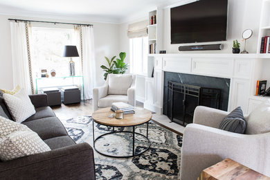 Transitional living room photo in Denver