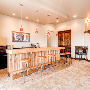 This is an example of a large bohemian walk-out basement in Denver with beige walls, porcelain flooring and no fireplace.
