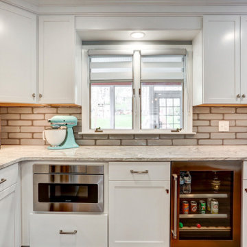 Open Floorplan and Bar Seating For A Restaurant Owner's Personal Kitchen