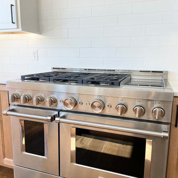 Ivory Painted and Maple Pecan Kitchen Design in Bettendorf, Iowa
