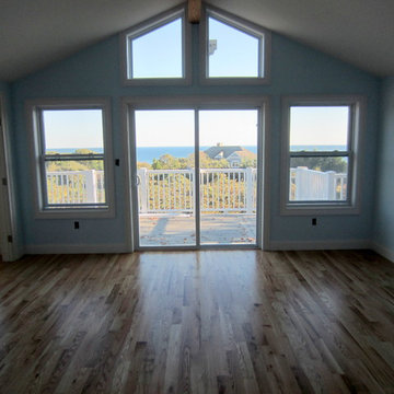 MONTAUK NEW CONSTRUCTION: 3 1/4" #1 RED OAK INSTALLED AND FINISHED NATURAL!