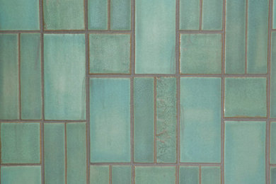 Bathroom - small craftsman 3/4 ceramic tile, blue floor and single-sink bathroom idea in Minneapolis with blue walls