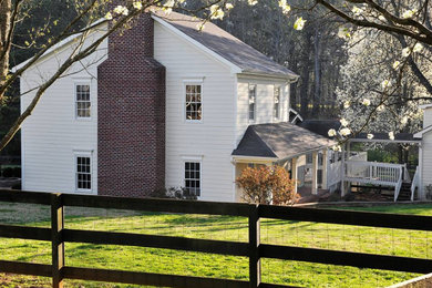 Mid-sized traditional white two-story wood exterior home idea in Atlanta with a shingle roof