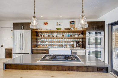 This is an example of a medium sized eclectic kitchen in Denver.