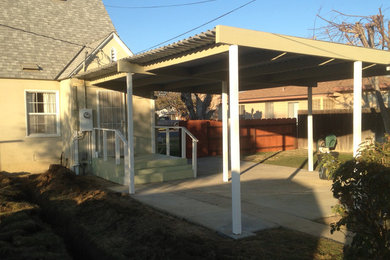 Patio - traditional patio idea in Other