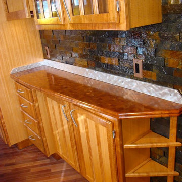 Figured cherry kitchen cabinets
