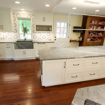 White Cabinets, Grey Countertops and Edgy Tile Backsplash
