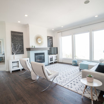Creamy white Living room with updated Fireplace