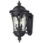 Z-Lite - Doma 5 Light Outdoor Wall Light in Black - Traditional and timeless, this large outdoor wall mount combines black cast aluminum hardware with clear water glass for a classic look.