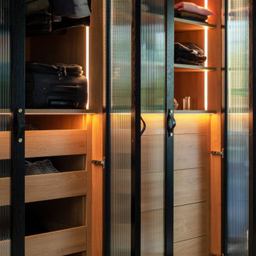 Modern fitted wardrobes for a dressing room