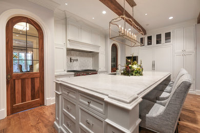 Eat-in kitchen - traditional medium tone wood floor and brown floor eat-in kitchen idea in Chicago with a single-bowl sink, shaker cabinets, gray cabinets, quartzite countertops, white backsplash, stone slab backsplash, stainless steel appliances, two islands and white countertops