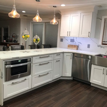 Contemporary Latte (White) Kitchen Remodel with waterfall counter top edge
