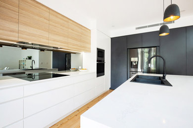 Mid-sized modern kitchen in Sydney.
