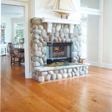 Reclaimed Douglas Fir Flooring by a Stacked Stone Fireplace