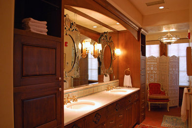 Large eclectic master multicolored tile and ceramic tile terra-cotta tile drop-in bathtub photo in Albuquerque with beaded inset cabinets, dark wood cabinets, beige walls, an undermount sink and marble countertops