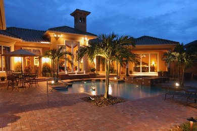Tuscan one-story exterior home photo in Miami