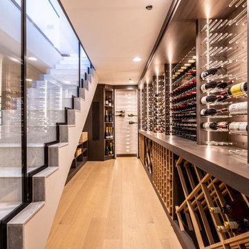 Custom Staircase Glass Wine Cellar & Display Cabinet in Newport Beach