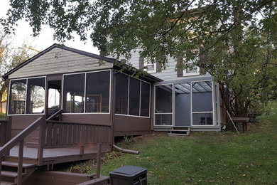 Patio - mid-sized contemporary backyard patio idea in Other with decking and a pergola