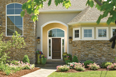 Dramatic Brown Front Door with Clean White Vinyl Windows