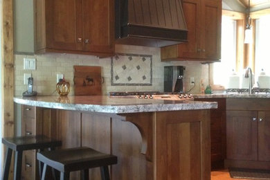 Mid-sized mountain style u-shaped medium tone wood floor eat-in kitchen photo in Toronto with a double-bowl sink, stainless steel appliances, shaker cabinets, dark wood cabinets, quartz countertops, multicolored backsplash and ceramic backsplash
