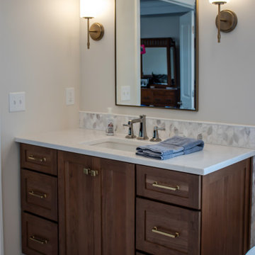 Luxury Spa Bathroom with Natural Warm Vanities, Quartz Countertop, Tiled Shower