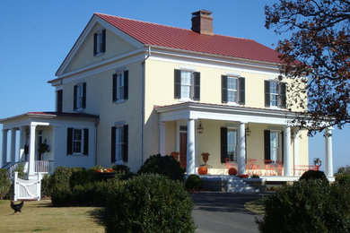 Farmhouse exterior home photo in Little Rock