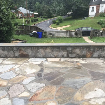 Irregular Flagstone Patioin Silver Spring MD With Stone Sitting Walls