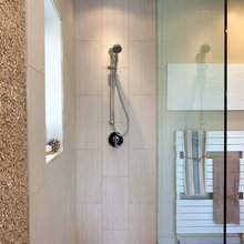 Shower wall and behind tub?