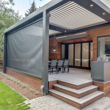 StruXure Adjustable Pergola Over Seating Area with Phantom Motorized Screens