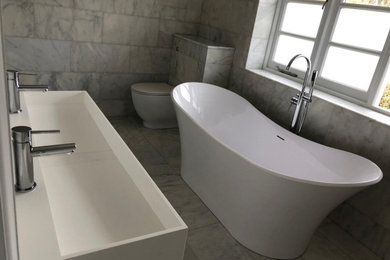 This is an example of a contemporary bathroom in Hertfordshire.