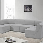 Meridian Furniture - Ollie Black Boucle Fabric U-Shaped Modular Sectional, Grey, 6-Piece: 4 Armless Chair, 2 Corner Chair - The Ollie Boucle Fabric Sectional is a truly stunning piece that boasts an elegant and attention-grabbing design. It is upholstered in a rich grey boucle fabric that feels soft and smooth to the touch, making it the perfect addition to any space that requires a touch of sophistication and style. The sectional's modular design ensures that it can easily fit into any room layout, while its plush cushioning provides optimum comfort for you and your guests. Whether you're entertaining guests or simply relaxing after a long day, the Ollie sectional is the perfect piece to help you unwind in style.