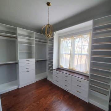 White and Matte Gold Large Custom Master Closet