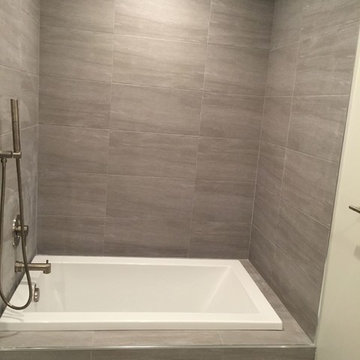 Bathroom Wall Tile and sunk in tub.