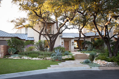 Example of a tuscan exterior home design in Austin
