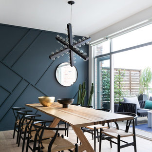Inspiration for a large eclectic open plan dining in Other with blue walls, light hardwood floors, no fireplace and beige floor.