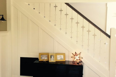 Inspiration for a farmhouse staircase remodel in Other