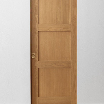 Flat-panel oak door in hallway — 90s Fixer, Reno interior design by Find Design