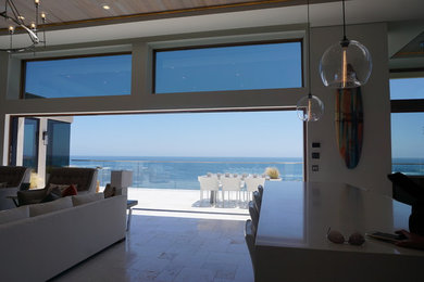 Example of a trendy family room design in San Diego