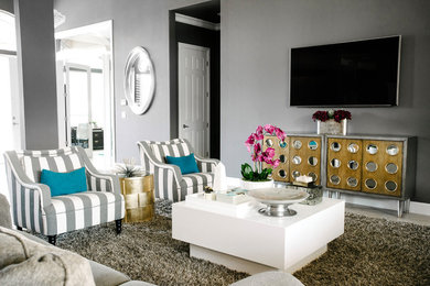 Mid-sized trendy formal and enclosed travertine floor and beige floor living room photo in Columbus with gray walls, a wall-mounted tv, a tile fireplace and a corner fireplace