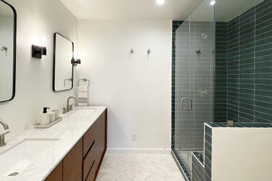 Mid-sized minimalist master green tile and ceramic tile double-sink, marble floor and beige floor bathroom photo in Los Angeles with flat-panel cabinets, brown cabinets, white walls, quartz countertops, a hinged shower door, white countertops, a built-in vanity and an undermount sink