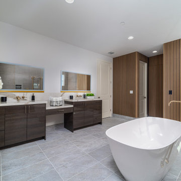 Elegant master bathroom with large format tile