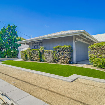 Front yard Remodel with Driveway Pavers, Walls, Artificial Grass, DG & More