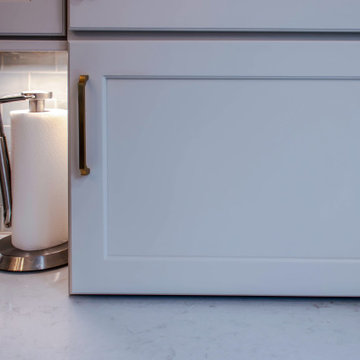 Two Tone Kitchen with Wood Stained and Light Beige Cabinets