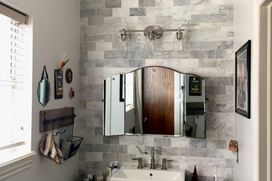 Example of a transitional bathroom design in Other