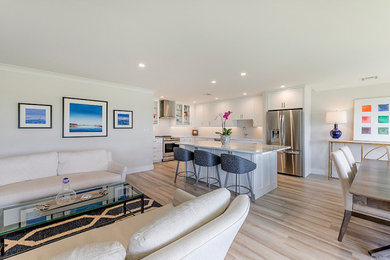Living room - coastal living room idea in Miami