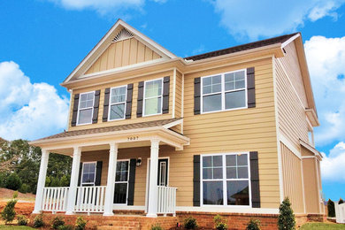 Example of a large classic home design design in Birmingham