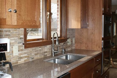 Example of a classic kitchen design in Other