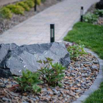 Luxury Backyard Retreat with Armour Stone & Water Feature | Genesis on the Lakes