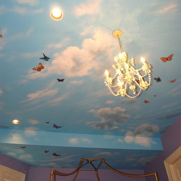 Sky Ceiling Mural with Butterflies, hand-painted in a bedroom by Mural Art LLC.
